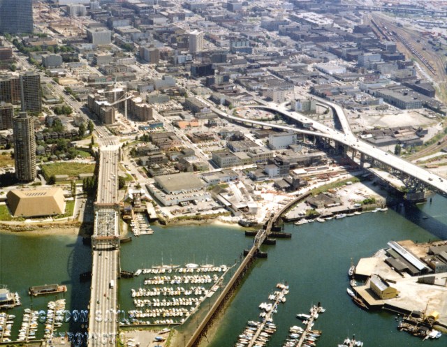 1970s-Aerial-view-of-Downtown-Vancouver-and-False-Creek-between-Burrard-Street-and-Granville-Street-Bridge-with-train-bridge-and-Granvill