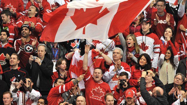 A large Canadian flag is waved during th